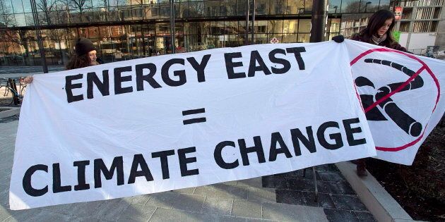A protest sign put up by Stop Energy East Halifax outside the library in Halifax, Monday, Jan. 26, 2015. TransCanada has cancelled the Energy East pipeline, a move hailed by climate groups.