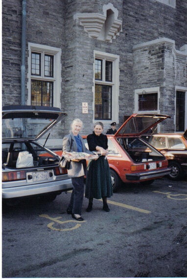 Second Harvest founders Ina Andre and Joan Clayton rescuing food in the 1980s.