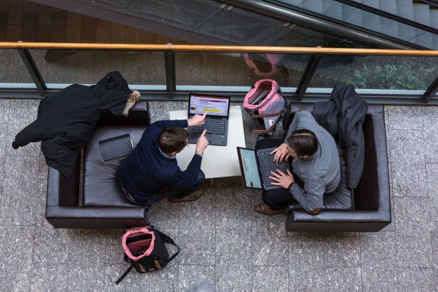 People work on laptop computers at the MaRS Discovery District building in Toronto, Ont.