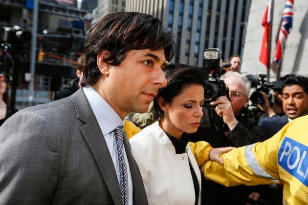 Jian Ghomeshi and his lawyer Marie Henein arrive at Old City Hall court in Toronto, Ont.