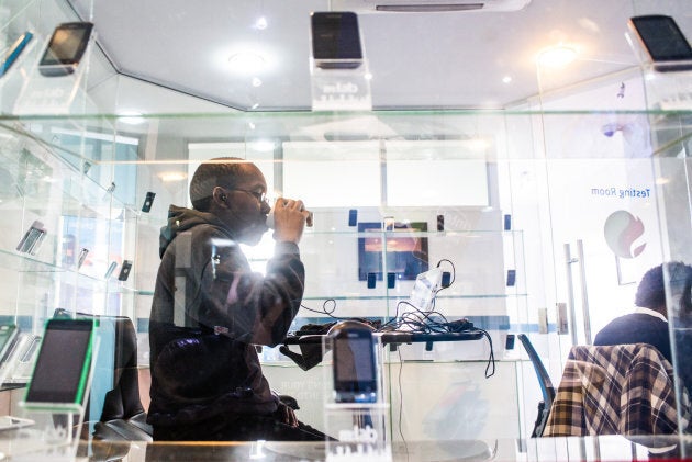 A tech entrepreneur works at a technology innovation center in Nairobi, Kenya.