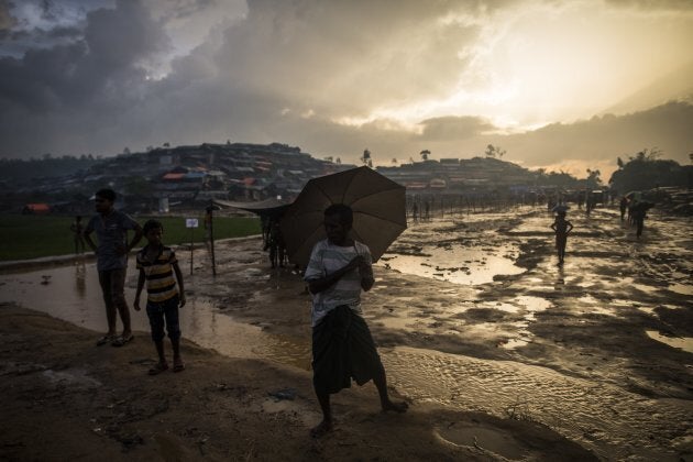 Rohingya people are seen during a rainy day at the Tankhali makeshift camp in Cox's Bazar, Bangladesh on Sept. 27, 2017.