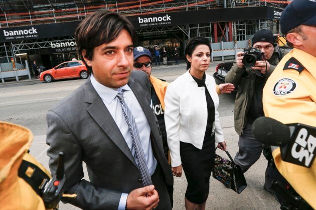 Jian Ghomeshi and his lawyer Marie Henein arrive at Old City Hall court.