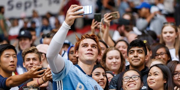 KJ Apa takes a selfie with fans after the Legends And Stars: Whitecaps FC Charity Alumni match at BC Place on September 16, 2017 in Vancouver. (Andrew Chin/Getty Images)