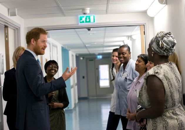 Prince Harry meets nursing staff during his visit to Mildmay hospital, a dedicated HIV hospital, to mark the opening of the new purpose built facility at Mildmay Hospital on December 14, 2015 in London, England.
