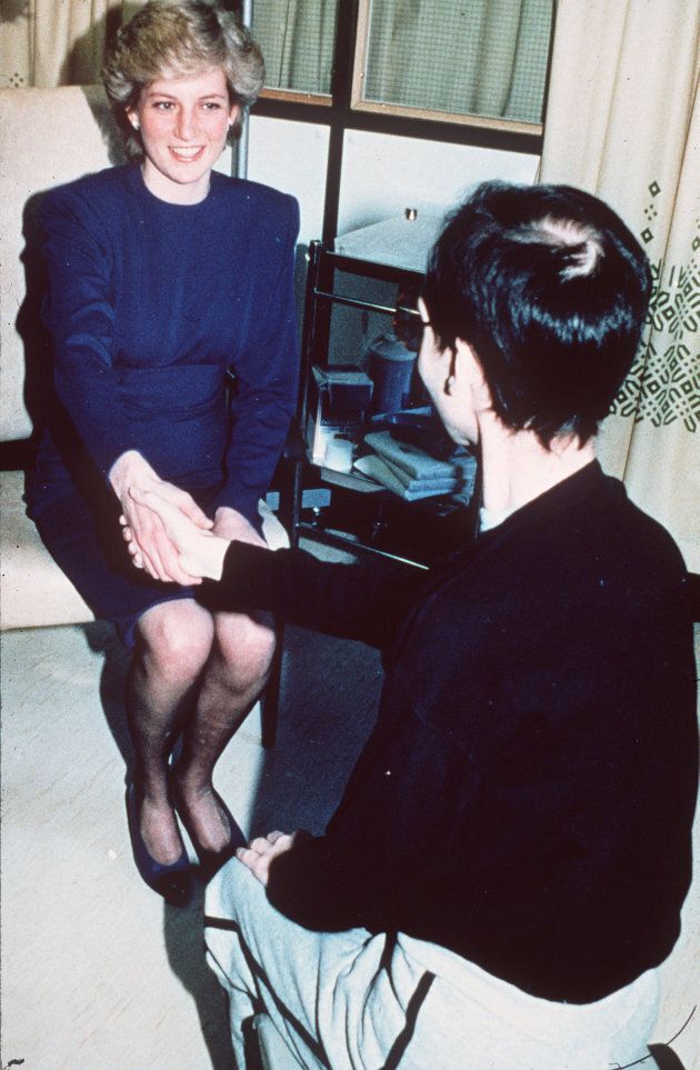 Diana, Princess of Wales shakes hands with an AIDS victim as she opens a new AIDS ward at the Middlesex Hospital in this April 9, 1987 file photo in London, England.