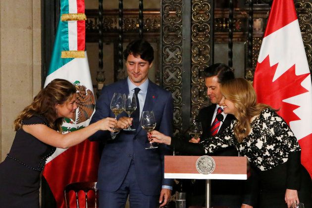 Sophie Gregoire Trudeau, Prime Minister Justin Trudeau, Mexican President Enrique Pena Nieto and Mexico's first lady Angelica Rivera make a toast during a dinner ceremony at the presidential palace in Mexico City, Mexico on Oct. 12, 2017.