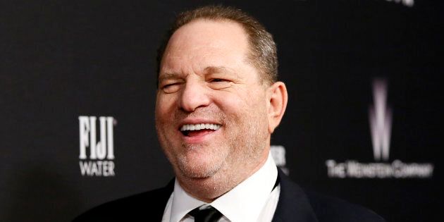 Producer Harvey Weinstein smiles as he arrives at The Weinstein Company & Netflix after-party after the 71st annual Golden Globe Awards in Beverly Hills, Calif., Jan. 12, 2014.
