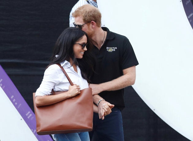 Britain's Prince Harry arrives with girlfriend Meghan Markle to the Invictus Games in Toronto, on Sept. 25, 2017.