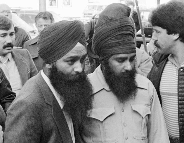 Inderjit Singh Reyat and Talwinder Singh Parmar enter the courthouse in Duncan, B.C. on Nov. 8, 1985.