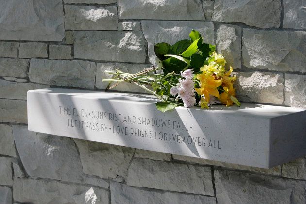 Flowers are left at the Air India memorial in Vancouver on July 27, 2007.