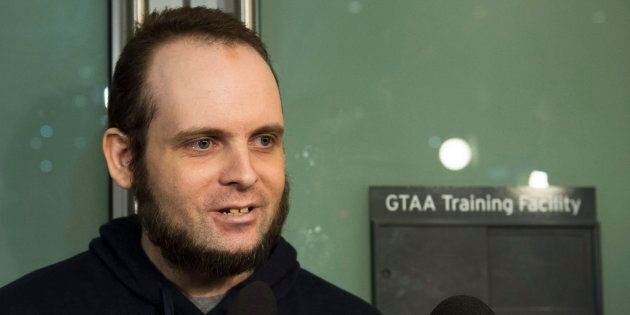 Joshua Boyle speaks to the media after arriving at the airport in Toronto on Oct. 13, 2017. Boyle, his wife and three children had been held hostage for five years by the Taliban-linked Haqqani network in Afghanistan.