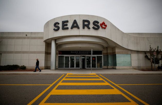A man walks in front of a Sears store in Mississauga, Ont. Oct. 6, 2017.