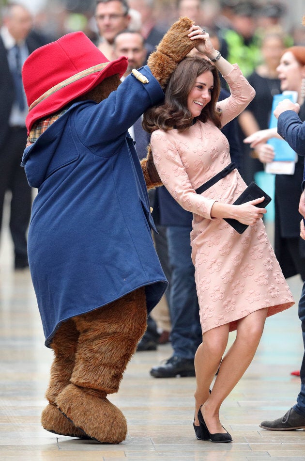 Catherine, Duchess of Cambridge dances with Paddington Bear as she attends the Charities Forum Event at Paddington Station on October 16, 2017 in London, England. (Photo by Max Mumby/Indigo/Getty Images)