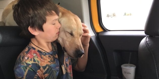 Canyon Mansfield and his Labrador retriever. The dog died and Mansfield was sickened after they checked out a cyanide trap meant for predators in Idaho in April.