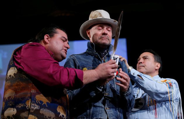 Gord Downie, centre, is honoured during the Assembly of First Nations Special Chiefs Assembly in Gatineau, Que. on Dec. 6, 2016.