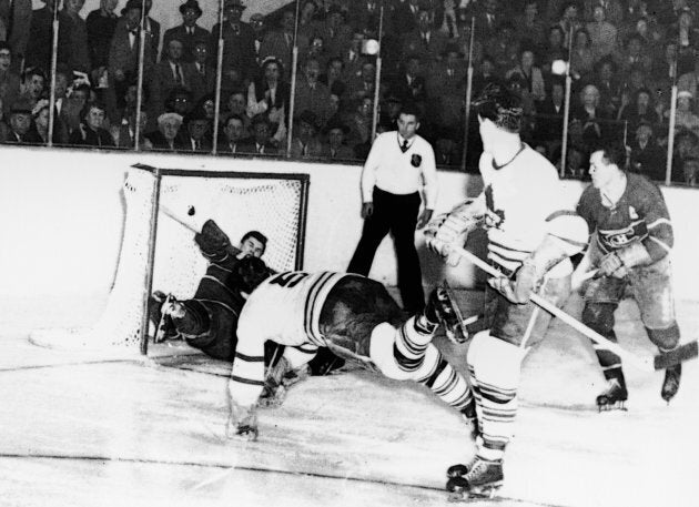 Bill Barilko (1927 - 1951) of the Toronto Maple Leafs scores the winning goal against the Montreal Canadiens during the final game of the Stanley Cup championship on April 21, 1951.