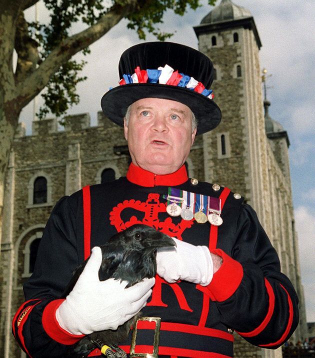 Yeoman Raven Master Derrick Coyle, holds Branwen, the newest addition to the ravens at The Tower of London, after an official naming ceremony.