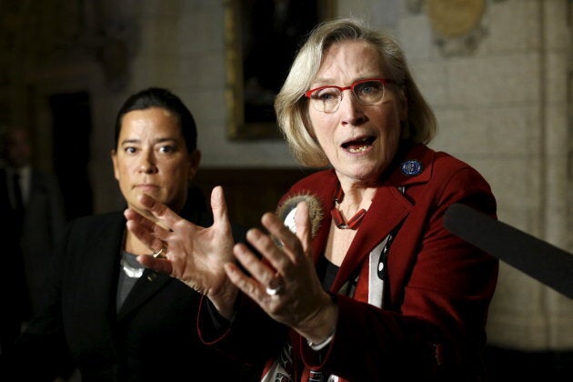 Canada's Indigenous Affairs Minister Carolyn Bennett, right, speaks during a news conference regarding a ruling by the Canadian Human Rights Tribunal with Justice Minister Jody Wilson-Raybould on Parliament Hill in Ottawa, Jan. 26, 2016.