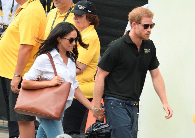 Meghan Markle and Prince Harry attend the Wheelchair Tennis at the Invictus Games Toronto 2017 at Nathan Philips Square on Sept. 25, 2017 in Toronto.