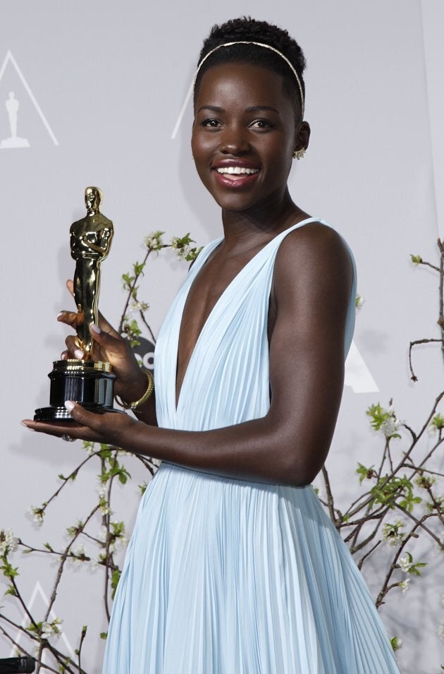 Lupita Nyong'o holds her Oscar for Best Supporting Actress for her role in "12 Years a Slave" at the 86th Academy Awards in Hollywood, California March 2, 2014.