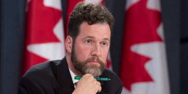 Scott Reid listens to a question during a press conference in Ottawa on Oct. 14, 2016.