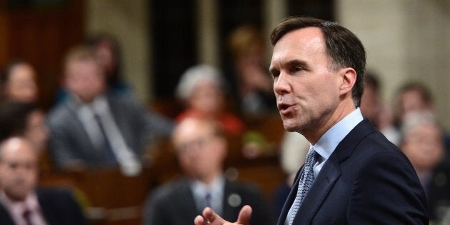 Finance Minister Bill Morneau stands during question period in the House of Commons on Oct. 23, 2017.