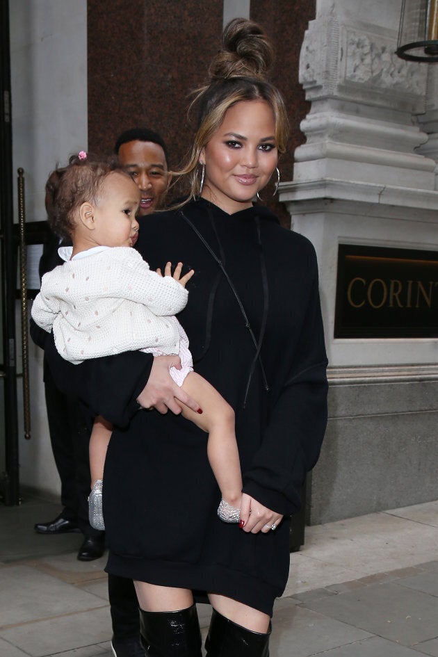 Chrissy Teigen with her daughter Luna, on Sept. 12, 2017 in London. (Neil Mockford/GC Images)