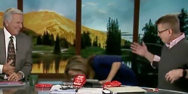 Natalie Tysdal, morning news anchor for Denver's KWGN-TV, throws up after attempting the chip company Paqui's