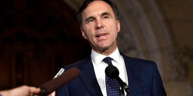 Finance Minister Bill Morneau speaks to reporters in the foyer of the House of Commons on Parliament Hill on Oct. 26, 2017.