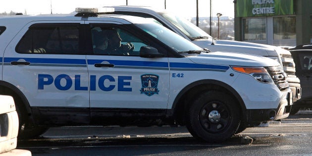 Police cars are seen outside the Halifax Shopping Centre Feb.14, 2015.