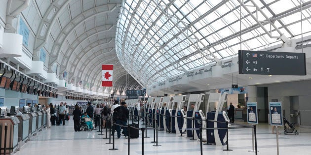 Departures level at Toronto's Lester B. Pearson International Airport. A couple who flew out of Pearson saysthey narrowly avoided being deported from the United Arab Emirates because an airline clerk at Pearson tore one of their passports.