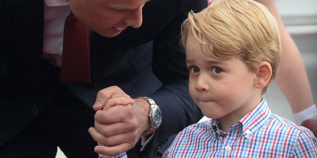 Prince William and Prince George of Cambridge arrive at Warsaw airport during an official visit to Poland and Germany on July 17, 2017 in Warsaw, Poland.