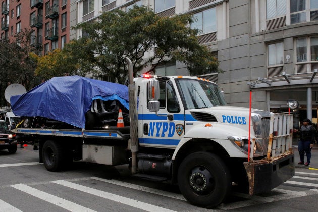 Police remove the pickup truck used in an attack on the West Side Highway in Manhattan, New York in Wednesday.