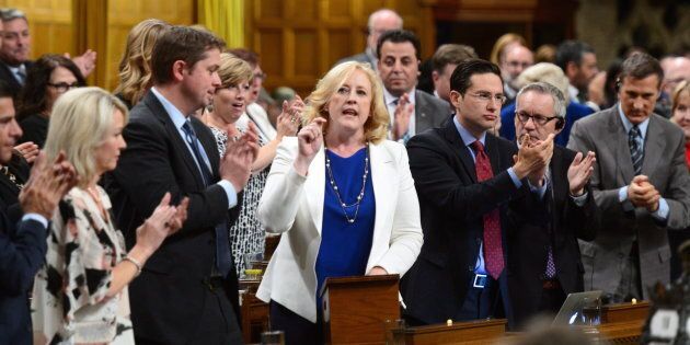 Conservative MP Lisa Raitt stands during question period in the House of Commons on Oct. 18, 2017.