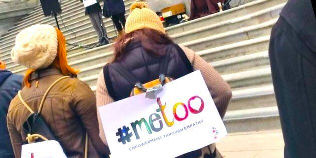 Protesters attend a #MeToo rally outside of the Vancouver Art Gallery on Saturday.