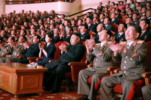 North Korean leader Kim Jong Un claps during a celebration for nuclear scientists and engineers who contributed to a hydrogen bomb test, in this undated photo released by North Korea's Korean Central News Agency (KCNA) in Pyongyang on Sept. 10, 2017.