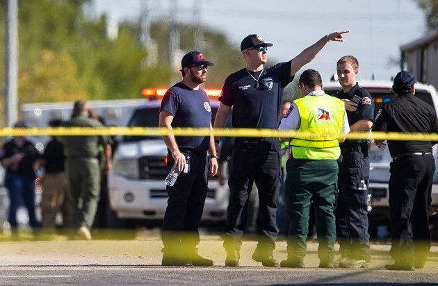 Law enforcement officials work the scene of a fatal shooting at the First Baptist Church in Sutherland Springs, Texas, on Nov. 5, 2017.