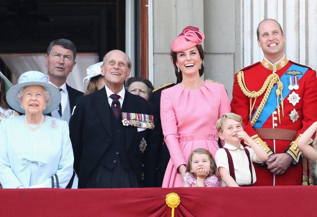 (L-R) Queen Elizabeth II, Prince Philip, Duchess of Cambridge, Princess Charlotte, Prince George and Prince William, Duke of Cambridge looking out at the Trooping the Colour parade in June 2017.