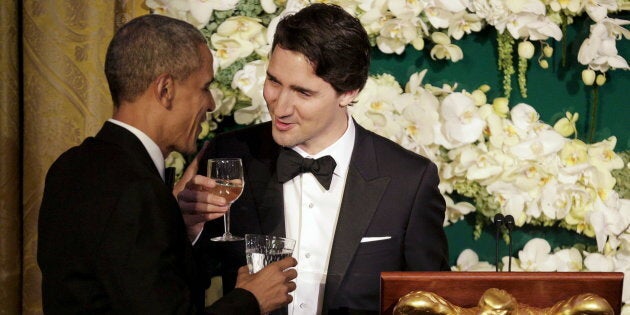 Prime Minister Justin Trudeau toasts former U.S. President Barack Obama during a state dinner at the...