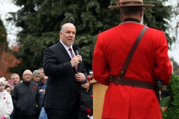 Premier John Horgan delivers a message during the Remembrance Day ceremony at Veterans Memorial Park in Langford, B.C.