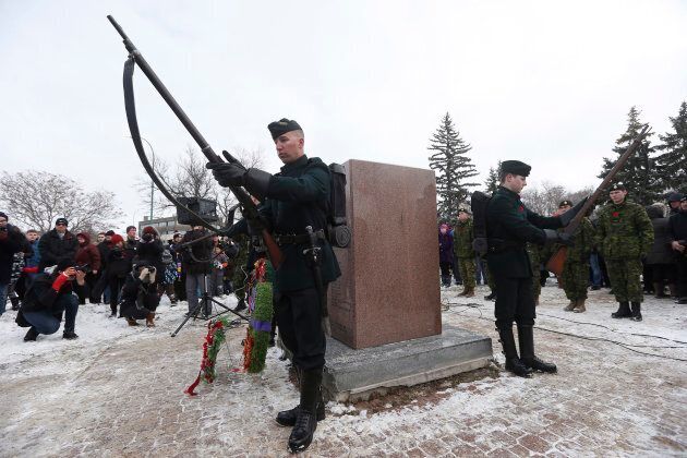 Royal Winnipeg Rifle skirmishers stand vigil guard at a cenotaph during a Remembrance Day service in Winnipeg.