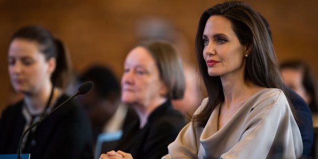 UNHCR Special Envoy Angelina Jolie listens to Minister of Foreign Affairs Chrystia Freeland after giving the keynote address to delegates at the 2017 United Nations Peacekeeping Defence Ministerial conference in Vancouver, Nov. 15, 2017.