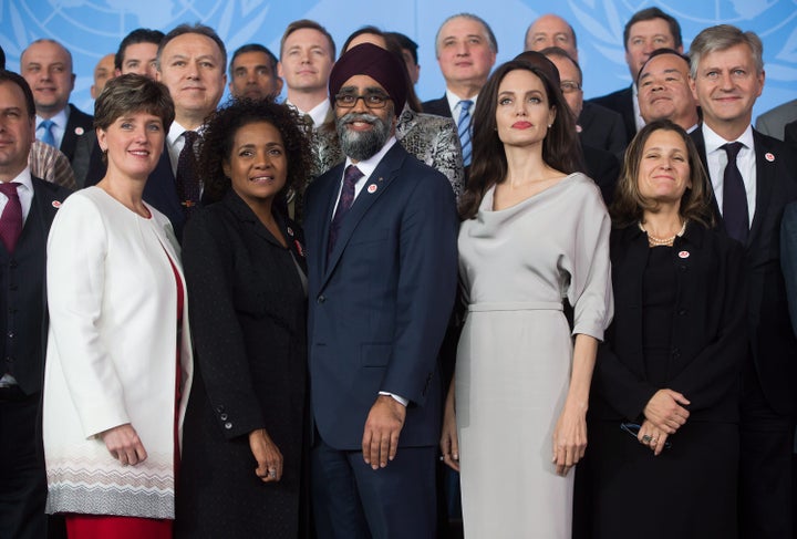 Angelina Jolie, front row 4th left, poses with delegates during the family photo at the 2017 United Nations Peacekeeping Defence Ministerial conference in Vancouver on Wednesday. Standing in the front row with her, from left to right, are Minister of International Development Marie-Claude Bibeau, Secretary General of La Francophonie Michaelle Jean, Defence Minister Harjit Sajjan and Minister of Foreign Affairs Chrystia Freeland.