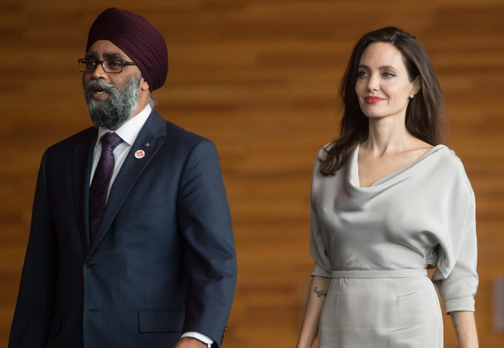 Defence Minister Harjit Sajjan, left, and UNHCR Special Envoy Angelina Jolie