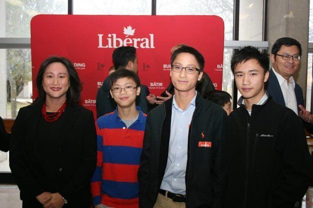 Jean Yip poses with her sons Theodore, Ethan, and Nathaniel on Nov. 12, 2017.
