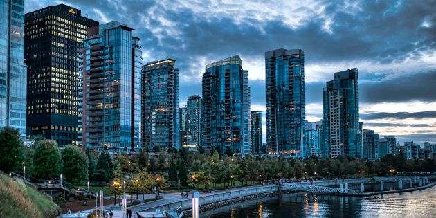 Condo towers overlooking Coal Harbour in Vancouver, Oct. 1, 2014. The condominium market has turned red-hot in Vancouver, with agents saying local and offshore buyers are snapping up units that are not yet completed, even as a foreign buyer tax has sent detached home sales plunging.