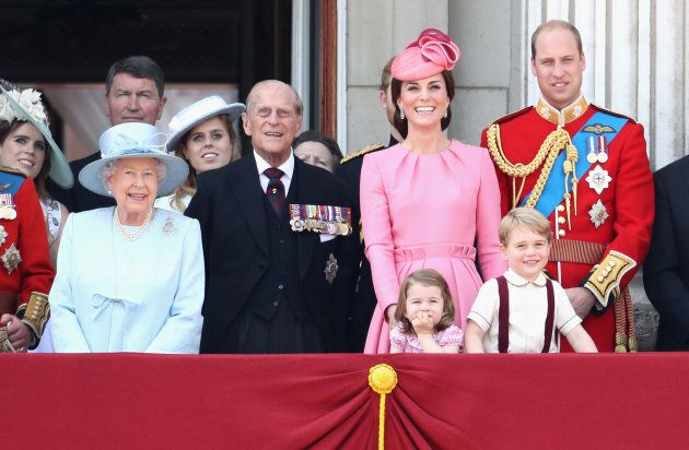(L-R) Queen Elizabeth II, Prince Philip, Duchess of Cambridge, Princess Charlotte, Prince George and Prince William look out from the balcony of Buckingham Palace in June 2017.