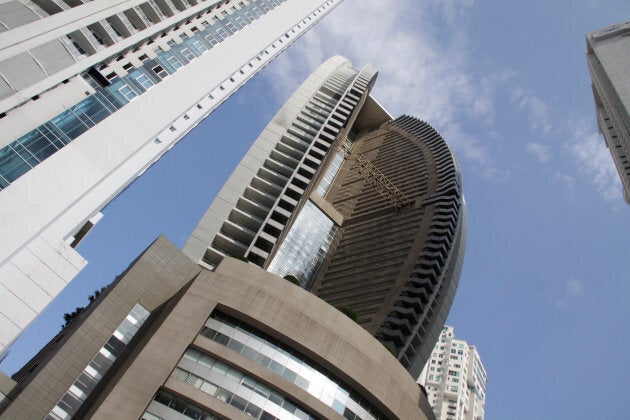 The Trump Ocean Club International Hotel and Tower Panama is seen between apartment buildings in Panama City, Panama October 11, 2017.