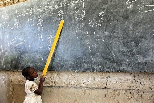 A young student takes part in lessons in Kenya.